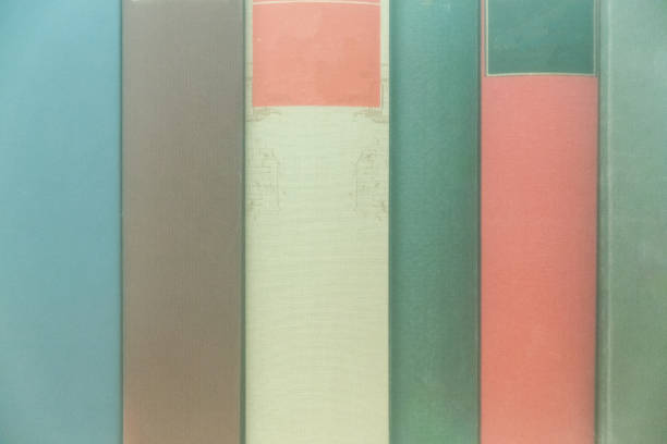 Different colored vintage books bound unlabeled