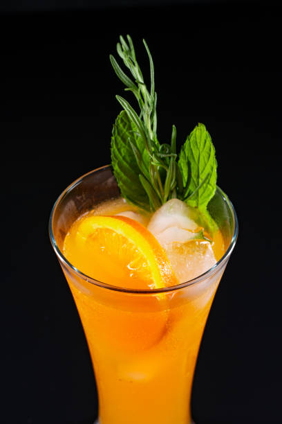 istock Summer drink, orange juice with ice cubes and alcohol 2160888533