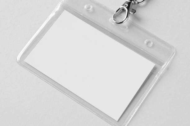 Businessman holding blank card.