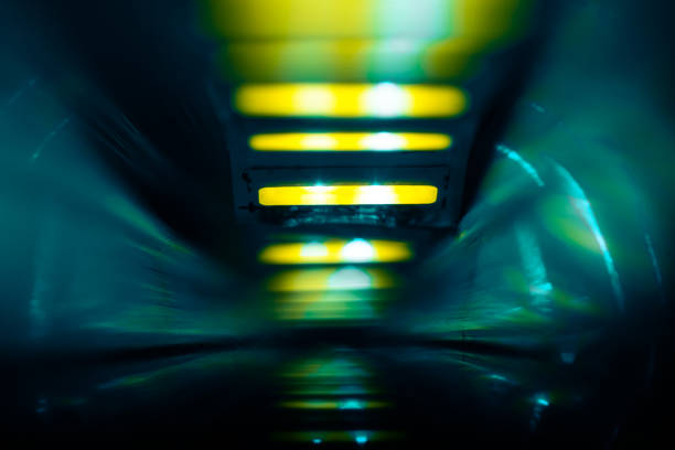 Top view of escalator stairs in shopping mall copy space