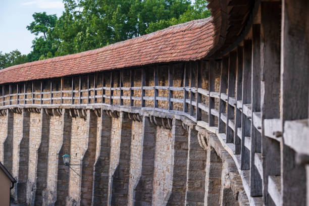 View along the old city wall of Rothenburg ob der Tauber in Middle Franconia in the evening