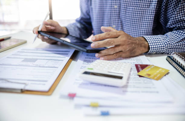 istock a man use credit card and paying 2160896278