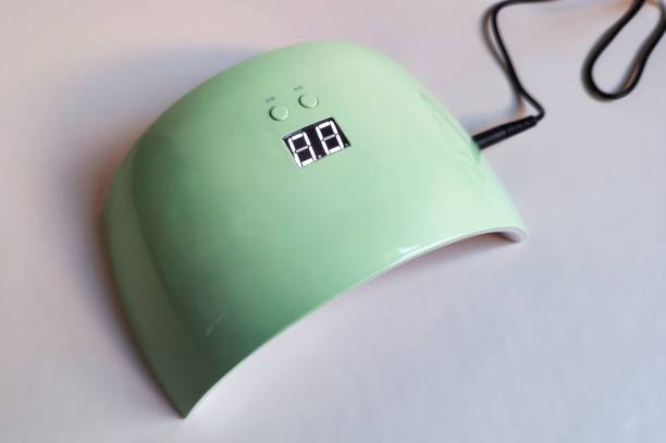 istock A lamp for fixing gel polish on nails. Manicure Tool 2160902481