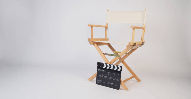 istock Director chair with clapper board on white background. 2160906859