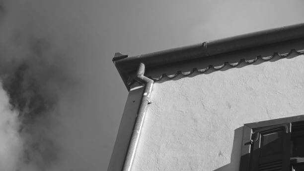 Architectural Detail Gutter On Building Black And White Angle Shot