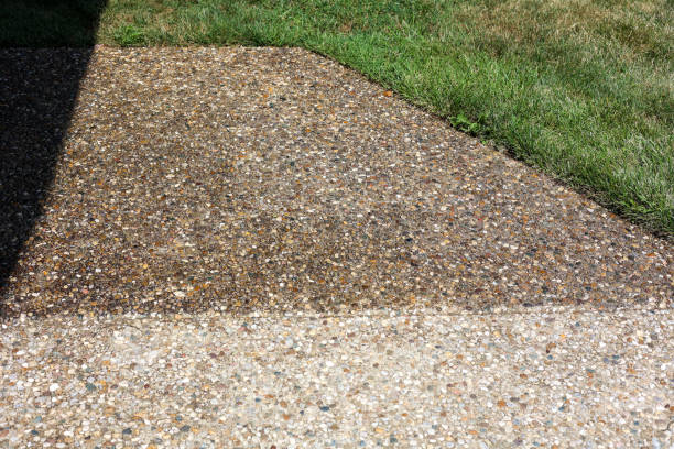 istock Clear Sealing concrete  on sidewalk in front of a home 2160915600