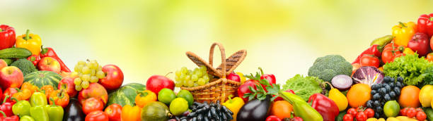 istock Collection bright berries, fruits and vegetables on green background. 2160919038