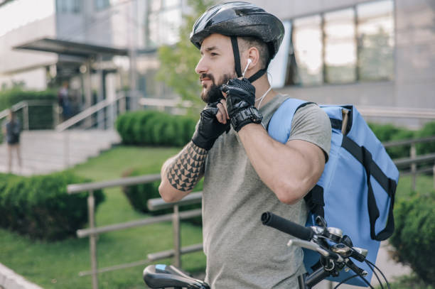istock Cyclist Preparing for a Ride in Urban Environment, Early Morning 2160933404