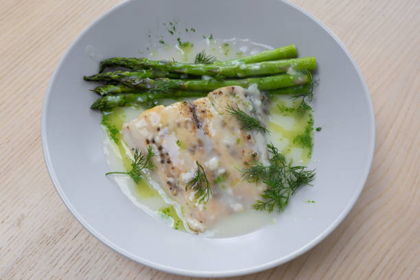 istock Barramundi and asparagus 2160937866