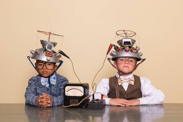 Young boys search the mysteries of the mind through a science experiment in the form of a mind reading helmet.
