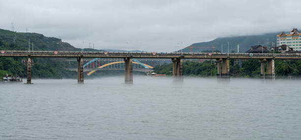 Busan, Korea - September 18, 2019: People fish near Millaksubyeon-ro, the Gwangan Bridge in the background.