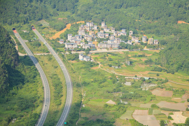 istock Modern Highway Passing Through a Village in Yangshuo, China 2160951434