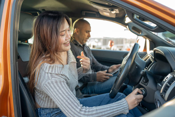 istock A Young Female Putting Car Keys In the Ignition 2160953917