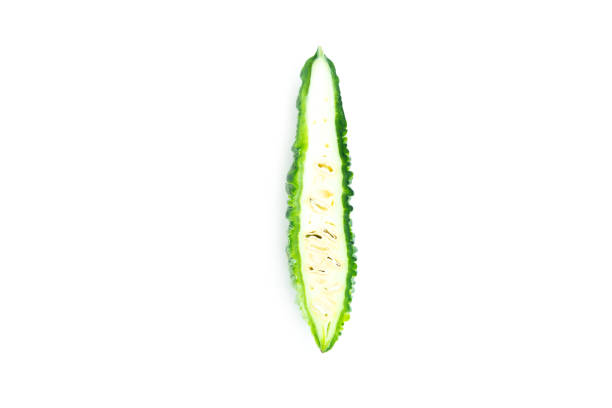 Bitter gourd fruit with cut in half isolated on white background, Organic vegetable, Herbal plant, Food ingredient