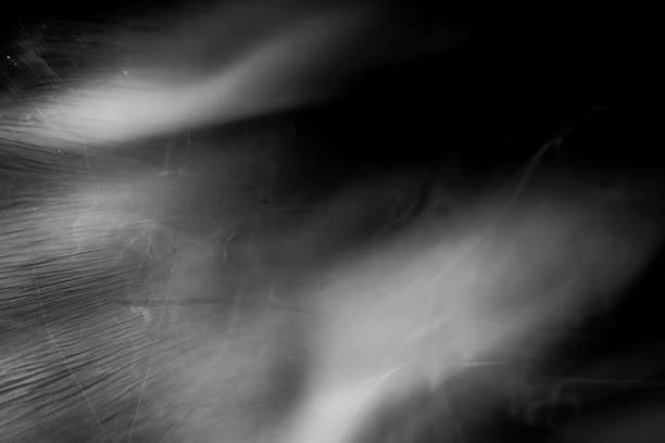 istock Abstract Background with lighting and smoke on black background 2160967431