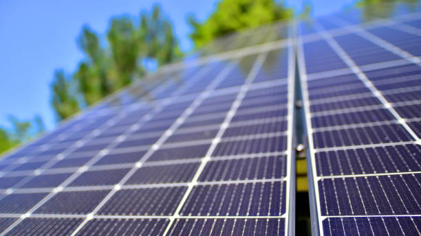 istock Group of solar panels on a blue sky. 2160971673