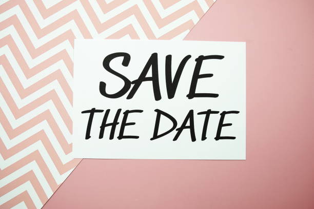 istock Save the Date card typography text on pink background 2160973377