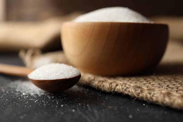 istock Sugar in a wooden bowl on burlap 2160973528