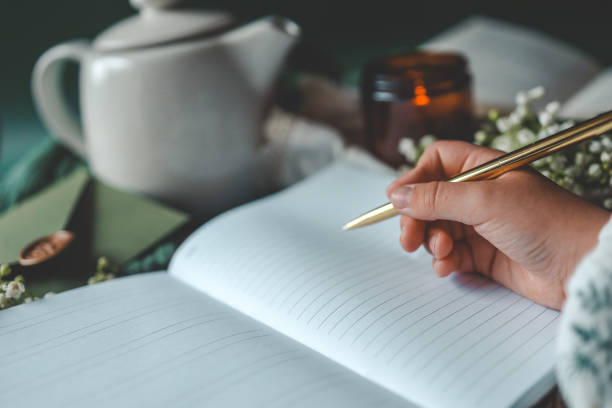 istock Girl writes in a notebook, aesthetics 2160974706
