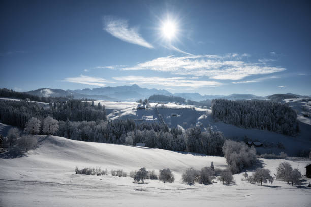 View to mountain Säntis from Herisau on a beautiful winter day against sunlight