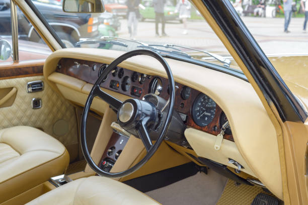 Cabin, Interior, steering wheel, dashboard of a Rolls-Royce Silver Shadow car at a retro auto parade. Cheboksary, Russia. June 15, 2024