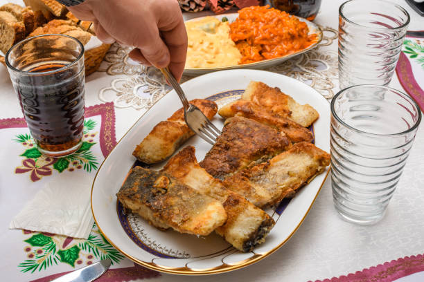 Place the fried carp breadcrumbs on a plate