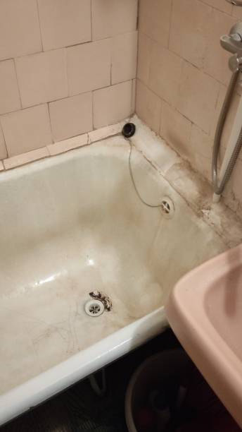 istock Old dirty and shabby bathroom. Vertical video 2160978645