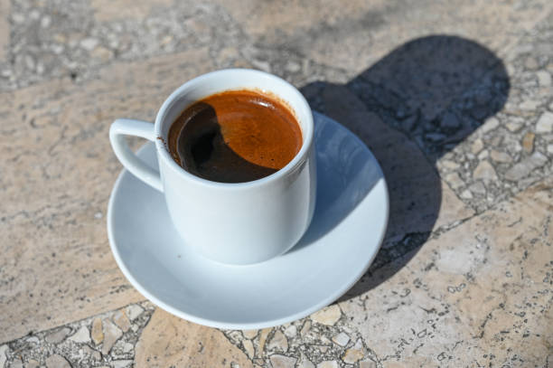 Turkish coffee in a white cup
