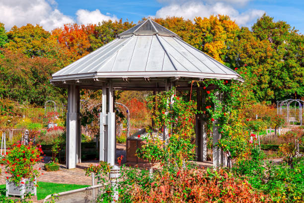 istock Domed gazebo is surrounded by a ornamental garden 2160982347