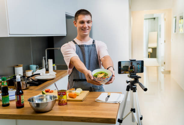 istock The chef is broadcasting live from workshop how to prepare a vegetarian food 2160983628