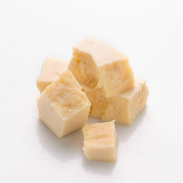 istock pieces of hard cheese on a white background 2160984252