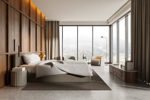 istock Modern bedroom interior with large windows, wooden accents, light decor. Minimalistic, cozy space. Concept of contemporary and luxury living.  3D Rendering 2160988366