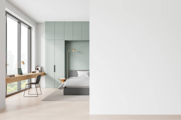istock Modern home bedroom interior with sleep and work zone, window. Mockup wall 2160988632