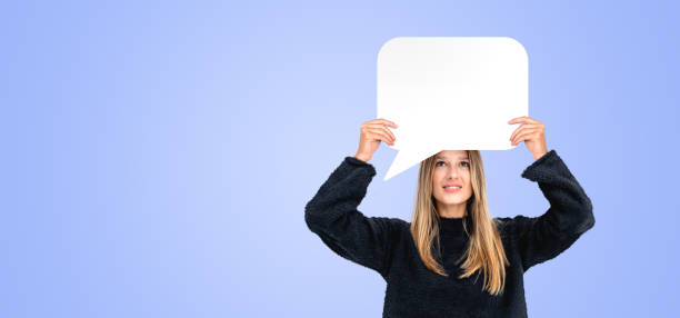 istock Woman with a blank mock up cloud above head, copy space background 2160988699