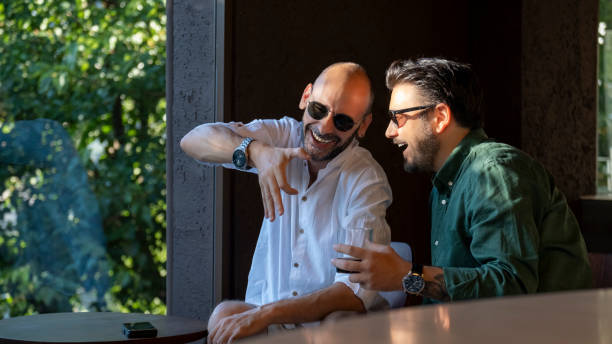 istock Two middle-aged businessmen spending time outside the office 2160991610