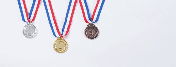 Gold silver and bronze mockup trophy medals with ribbon for school university or national or sport even organization competition. Isolated on white background. Award and victory concept