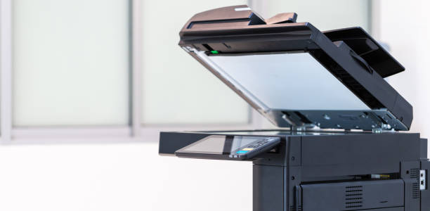 istock photocopier or network printer is office worker tool equipment for scanning and copy paper. 2160991925