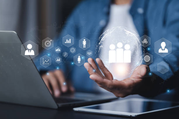 istock Businessman showing virtual graphic human icon HR human resources recruitment team Staff management business concept. 2160992007