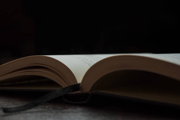 istock open book close up with bookmark 2160994172