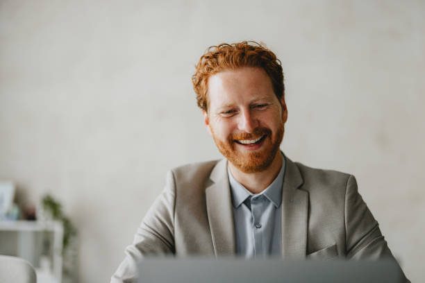 istock Happy Business Professional Working In Office Environment 2160994946