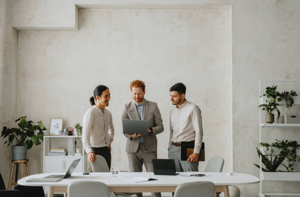 istock Professional Business Team Discussing Ideas in Modern Office 2160994958