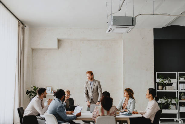 istock Group Business Meeting in Modern Office Setting 2160994965
