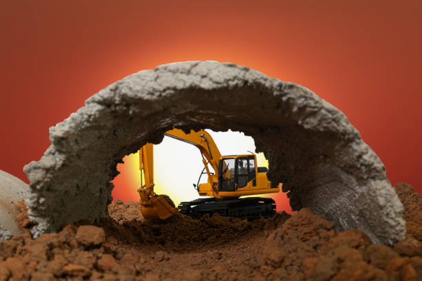 istock Crawler excavator are digging soil in the tunnel construction site. 2160995022