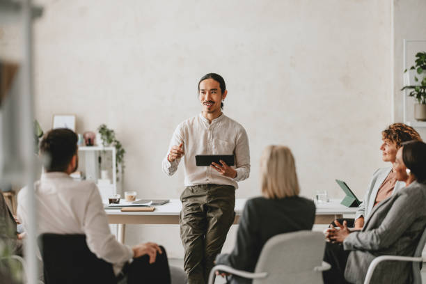 Business Meeting With a Team Leader Presenting Ideas