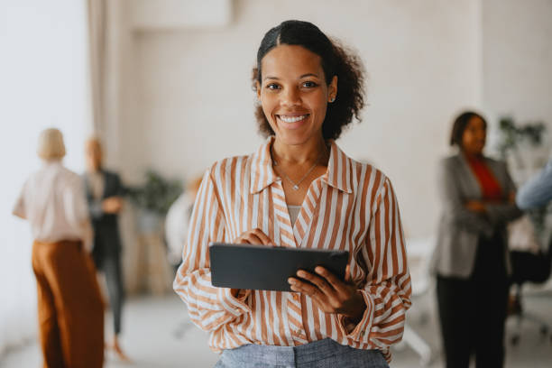 istock Happy Businesswoman Using Tablet At Office Meeting 2160995051