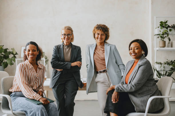 istock Group Of Professional Women in Modern Office Setting 2160995829