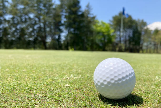 istock Golf course and a beautiful white golf ball 2160996027