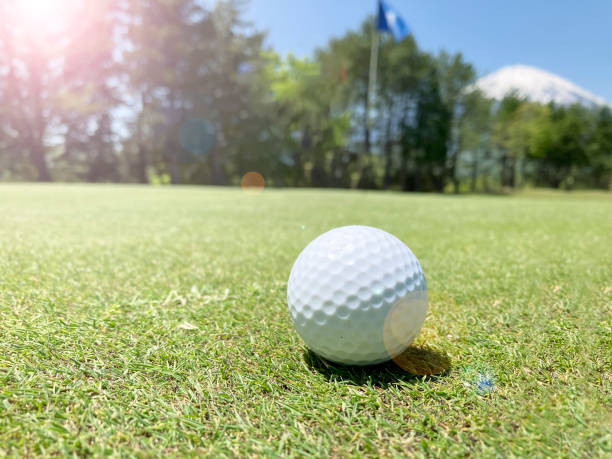 istock Golf course and a beautiful white golf ball 2160996127