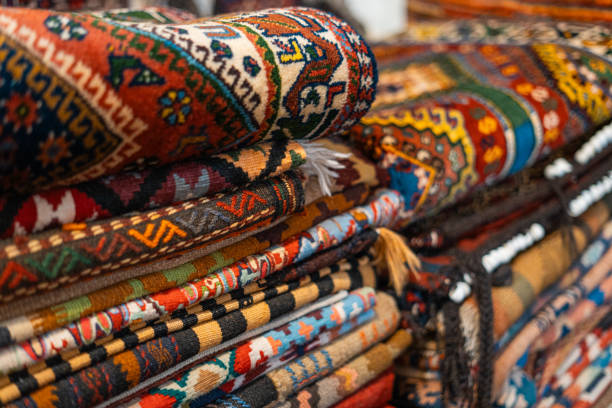 Stack of Colorful Handwoven Rugs