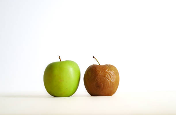 istock healthy and rotten apple 2161005374